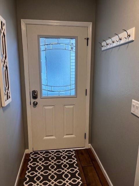 3403 Lever St Unit B, Eau Claire, WI 54701 - doorway to outside with baseboards and dark wood finished floors