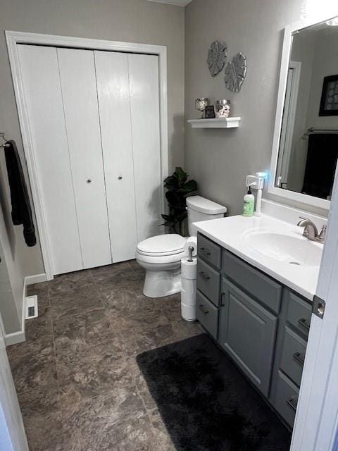 3403 Lever St Unit B, Eau Claire, WI 54701 - bathroom featuring toilet, vanity, and stone finish floor