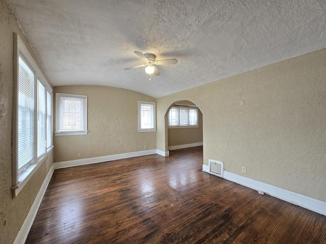 5535 N 40th St, Milwaukee, WI 53209 - unfurnished room with a ceiling fan, hardwood / wood-style floors, visible vents, and a textured wall