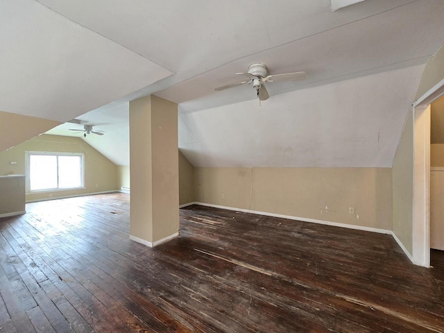 5535 N 40th St, Milwaukee, WI 53209 - additional living space with vaulted ceiling, hardwood / wood-style floors, a ceiling fan, and baseboards