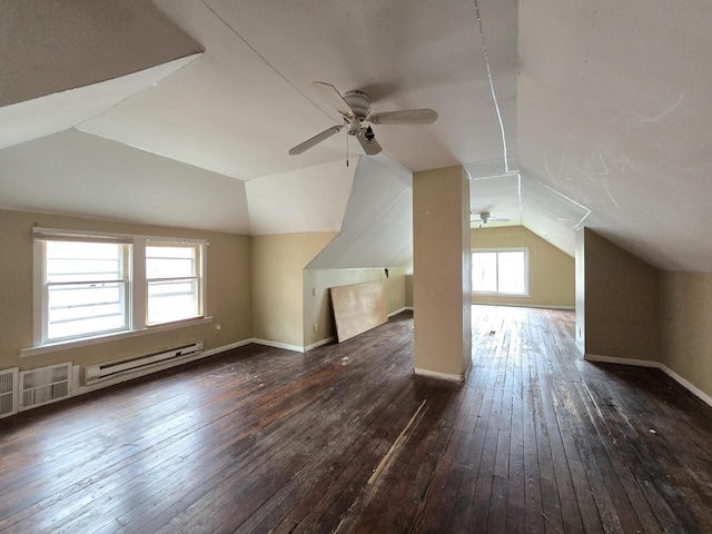 5535 N 40th St, Milwaukee, WI 53209 - additional living space with a ceiling fan, baseboard heating, baseboards, vaulted ceiling, and hardwood / wood-style floors