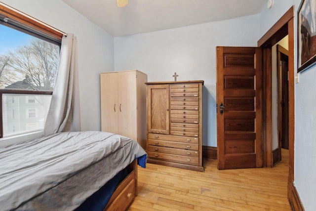 bedroom with light wood finished floors