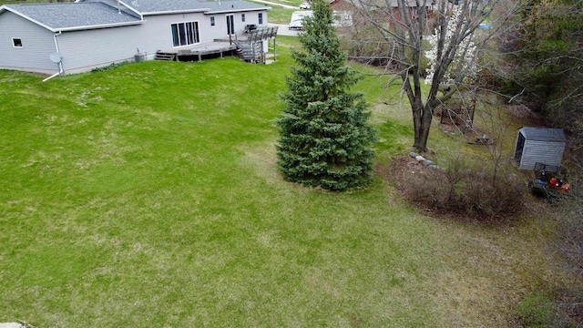 view of yard with a wooden deck