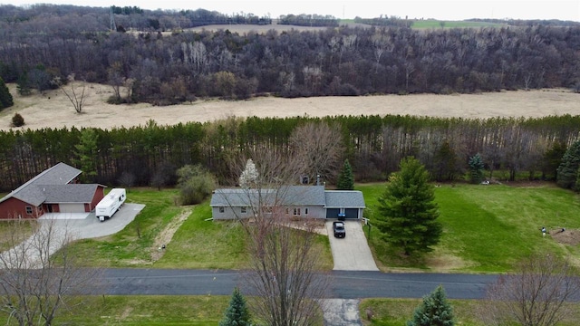 bird's eye view with a forest view