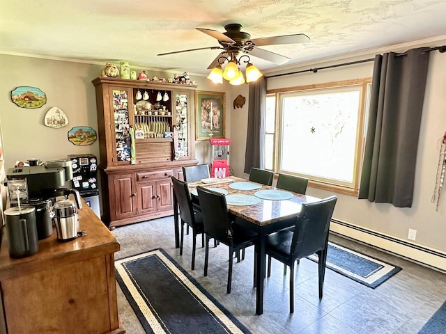 dining area with crown molding, a ceiling fan, and baseboard heating