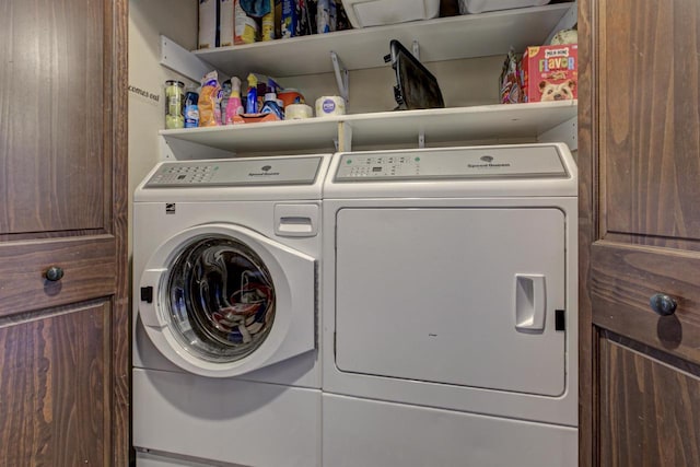 washroom with laundry area and washer and clothes dryer