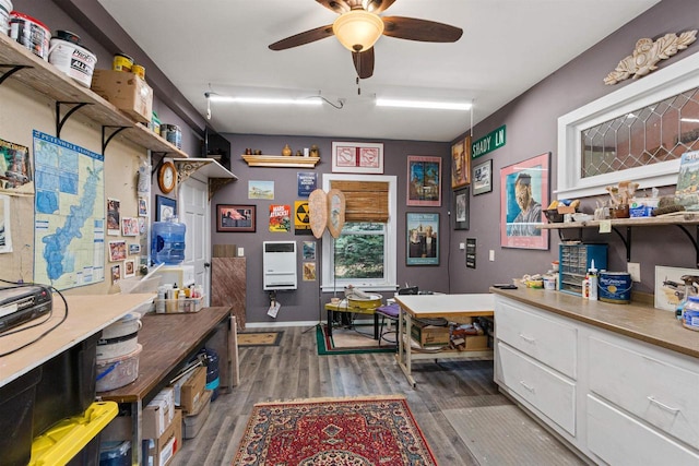 interior space with ceiling fan and wood finished floors