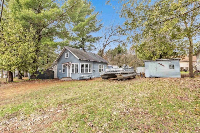 view of yard featuring a deck, an outdoor structure, and a storage shed