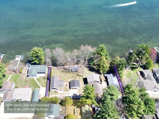 birds eye view of property with a residential view