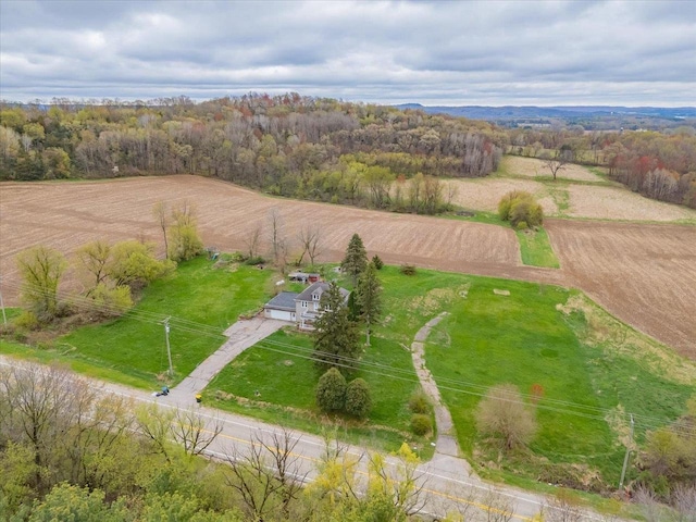 bird's eye view featuring a rural view and a forest view
