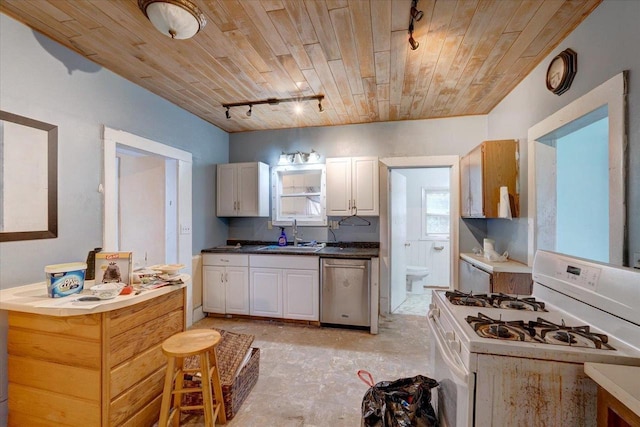 kitchen with stainless steel dishwasher, wood ceiling, a sink, track lighting, and white range with gas cooktop