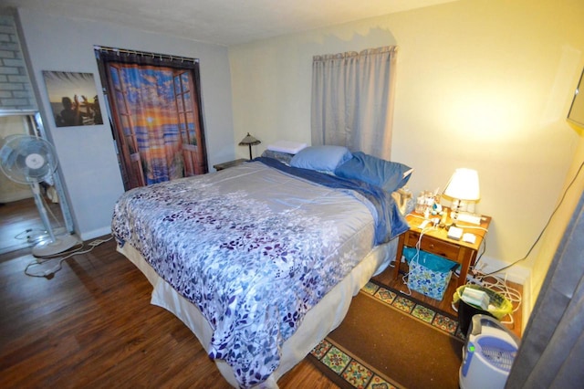 bedroom with wood finished floors