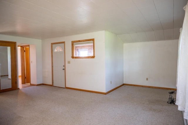 interior space featuring baseboards