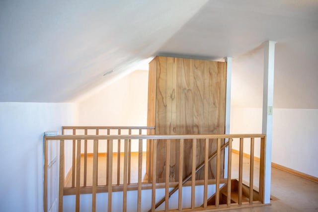 bonus room featuring vaulted ceiling