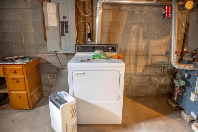 clothes washing area with electric panel, washer / clothes dryer, and laundry area