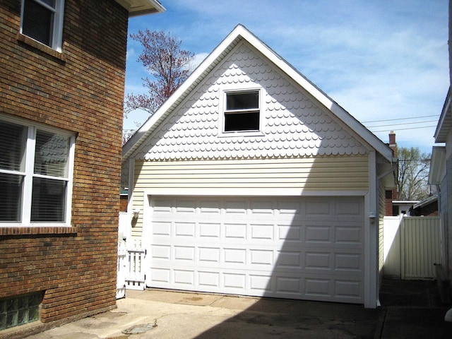 garage with fence