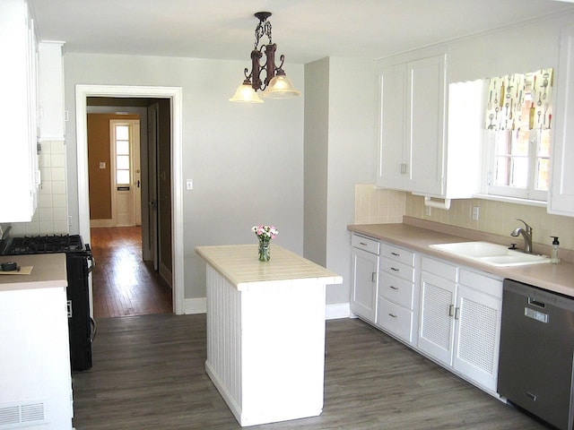 kitchen with a center island, dishwasher, range with gas stovetop, dark wood-style flooring, and a sink
