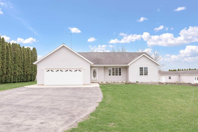 W11330 Rose Eld Rd, Ripon, WI 54971 - ranch-style house featuring a front lawn, aphalt driveway, and an attached garage