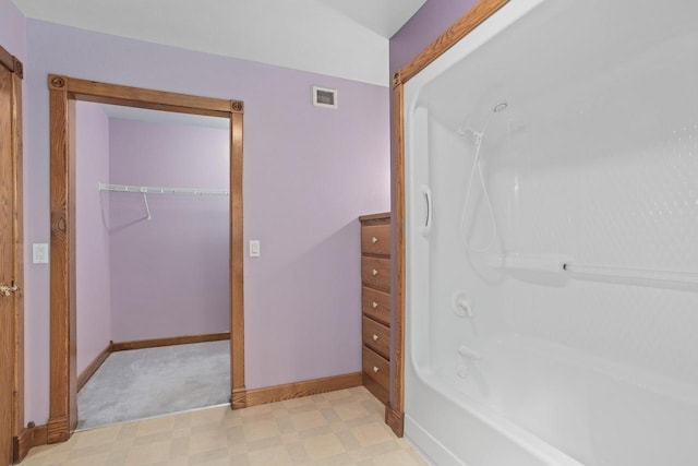W11330 Rose Eld Rd, Ripon, WI 54971 - bathroom featuring baseboards, tile patterned floors, visible vents, and bathing tub / shower combination