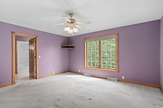 W11330 Rose Eld Rd, Ripon, WI 54971 - carpeted spare room featuring visible vents, baseboards, and a ceiling fan