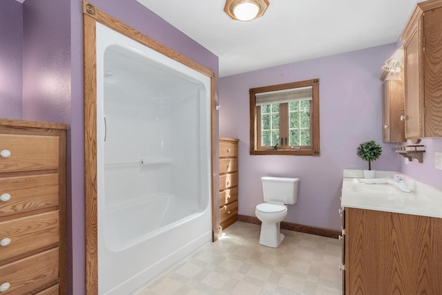 W11330 Rose Eld Rd, Ripon, WI 54971 - bathroom with tile patterned floors, toilet, baseboards, and vanity