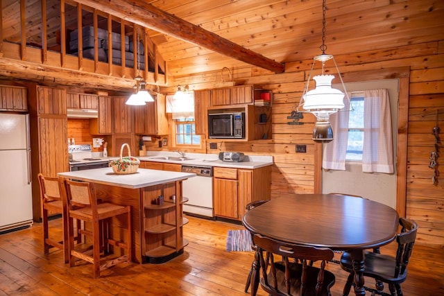 kitchen with white appliances, light countertops, open shelves, and a sink
