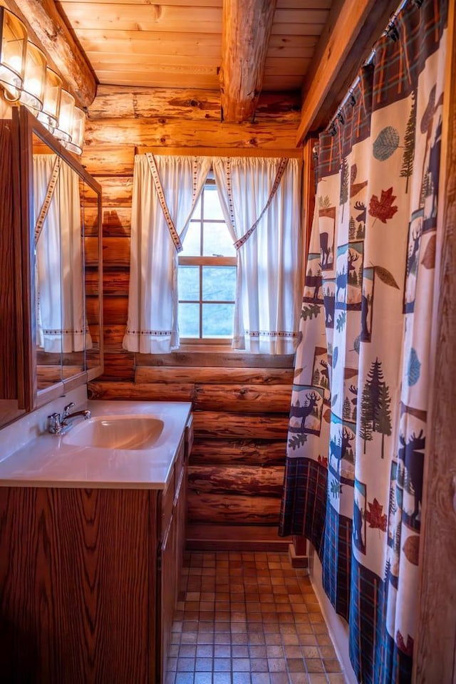 bathroom featuring brick floor, vanity, log walls, wooden ceiling, and a shower with shower curtain