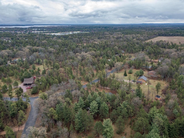 bird's eye view featuring a view of trees