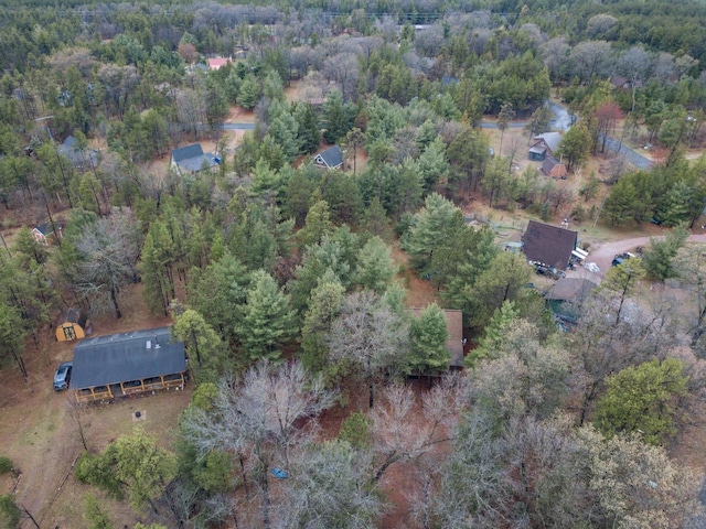 aerial view featuring a forest view