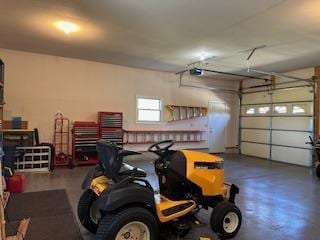 garage featuring a garage door opener