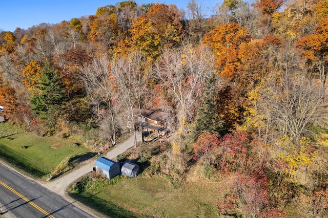 aerial view featuring a forest view