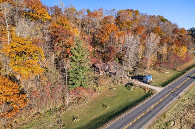 drone / aerial view with a view of trees