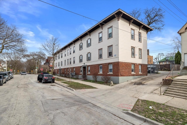 3303 W Juneau Ave Unit 3311, Milwaukee, WI 53208 - exterior space featuring brick siding