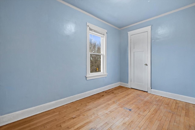 3303 W Juneau Ave Unit 3311, Milwaukee, WI 53208 - empty room featuring hardwood / wood-style floors, baseboards, and ornamental molding