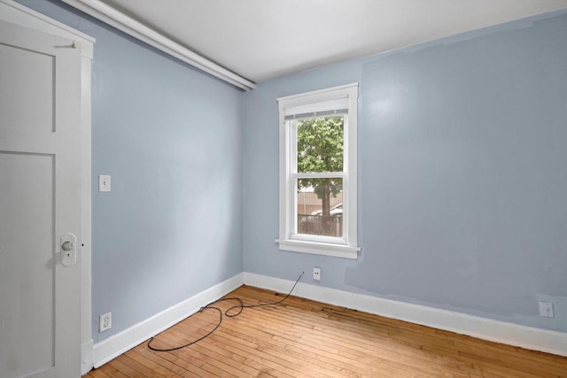 3303 W Juneau Ave Unit 3311, Milwaukee, WI 53208 - empty room featuring light wood finished floors and baseboards