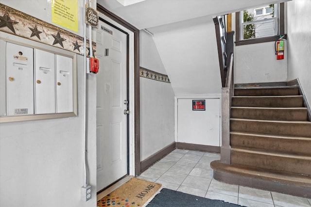 3303 W Juneau Ave Unit 3311, Milwaukee, WI 53208 - stairs with tile patterned flooring and lofted ceiling