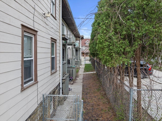 3303 W Juneau Ave Unit 3311, Milwaukee, WI 53208 - view of home's exterior featuring a gate and fence private yard