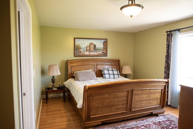 416 Gannon Ct, Tomah, WI 54660 - bedroom with light wood-style floors