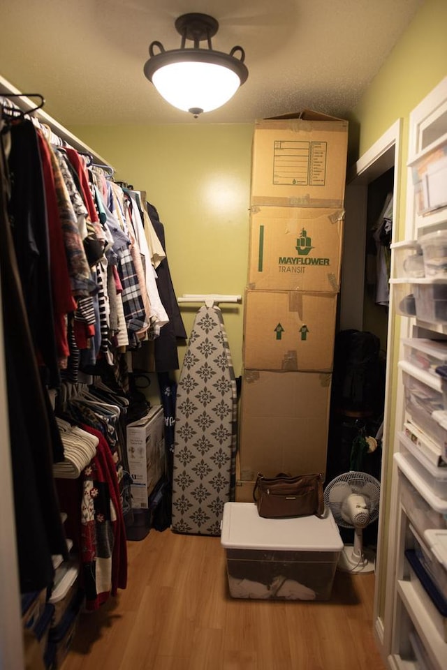 416 Gannon Ct, Tomah, WI 54660 - walk in closet with wood finished floors