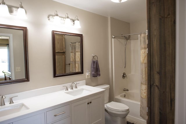 416 Gannon Ct, Tomah, WI 54660 - full bath with toilet, double vanity, a sink, and shower / bathtub combination with curtain