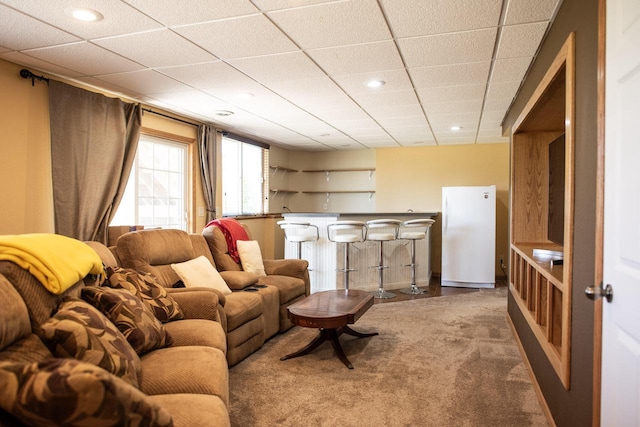 416 Gannon Ct, Tomah, WI 54660 - carpeted living area with recessed lighting and bar area
