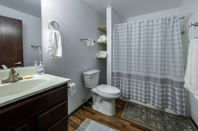 full bathroom with vanity, toilet, a shower with shower curtain, and wood finished floors