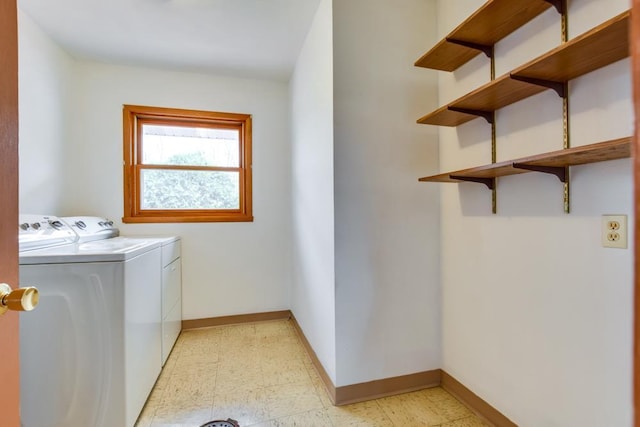W10940 W Harmony Dr, Lodi, WI 53555 - clothes washing area featuring washer and clothes dryer, baseboards, and light flooring