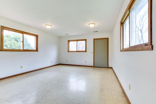 W10940 W Harmony Dr, Lodi, WI 53555 - empty room featuring light floors and baseboards