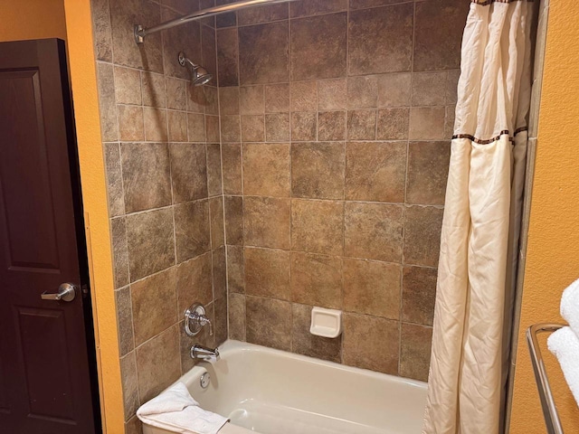 full bath featuring shower / bathtub combination with curtain