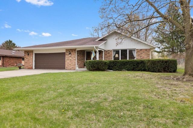 single story home featuring concrete driveway, an attached garage, a front lawn, and brick siding