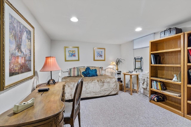 carpeted bedroom with recessed lighting