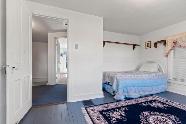 W444 Carlson Ln, Oconto Falls, WI 54154 - bedroom with wood-type flooring and baseboards