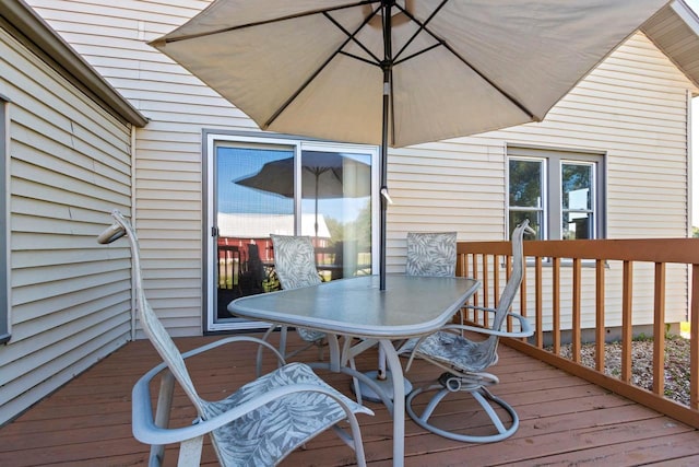 W444 Carlson Ln, Oconto Falls, WI 54154 - wooden deck featuring outdoor dining area