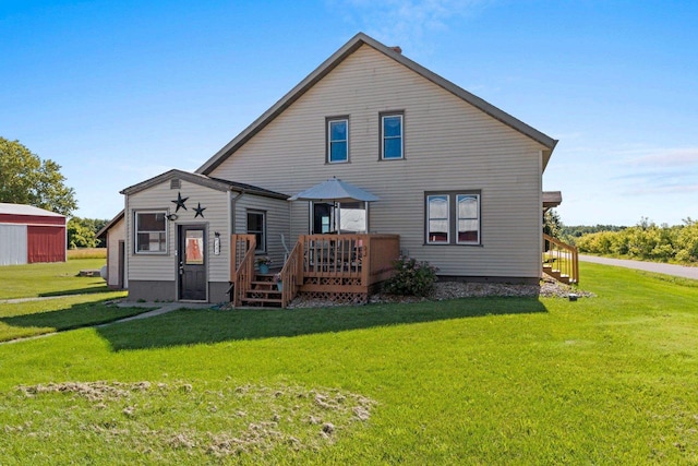 W444 Carlson Ln, Oconto Falls, WI 54154 - back of house with a wooden deck and a lawn
